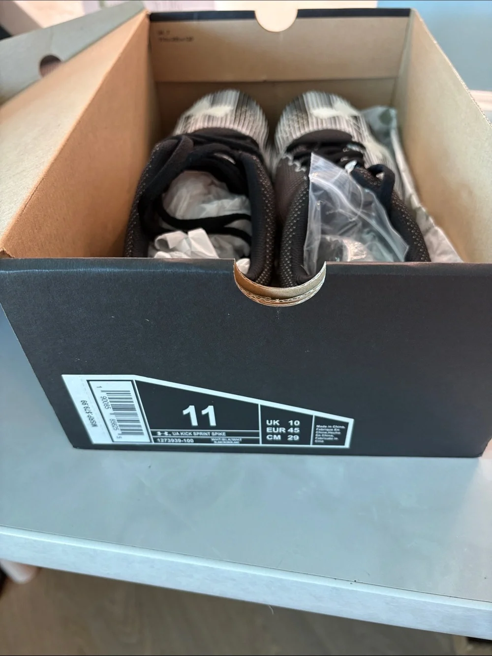 Under Armour Black & White Striped Athletic Cleats